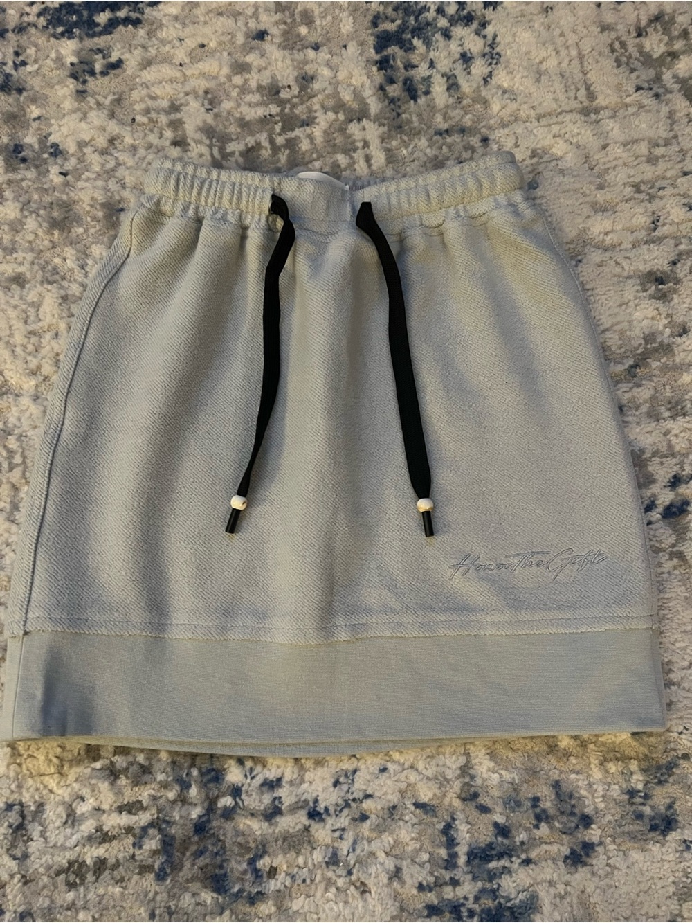 Light Blue Drawstring Mini Skirt with Script Detail